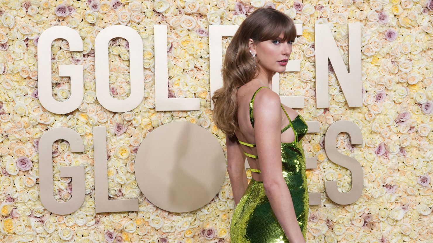 Taylor Swift looks chic in green on Golden Globes red carpet