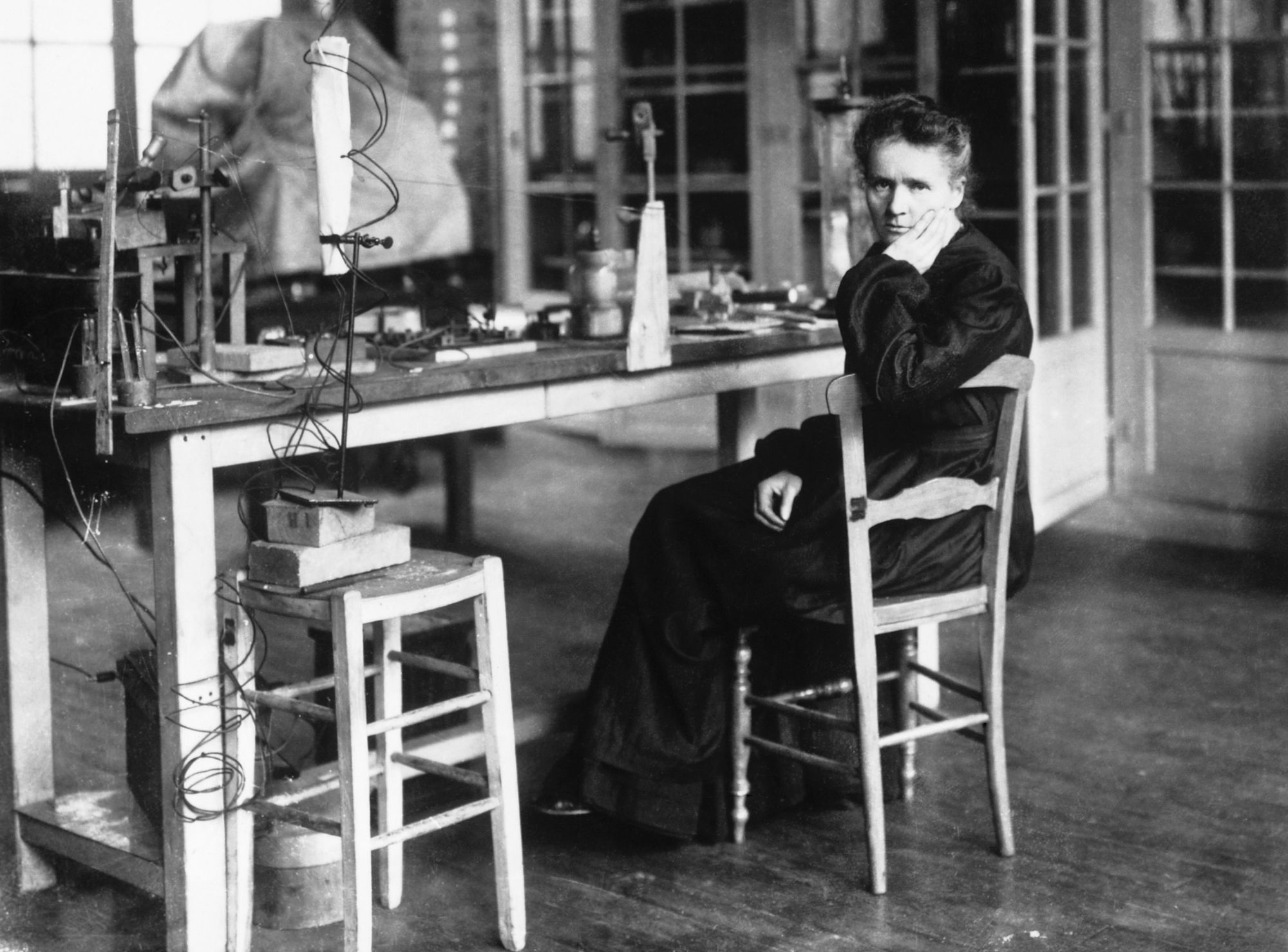 Marie Sklodowka Curie (1867 - 1934) in her laboratory. She shared a Nobel Prize in Physics in 1903 with her husband Pierre for their work in radioactivity. In 1911 she became one of the few people to be awarded a second Nobel Prize, this time in chemisty for her discovery of poloium and radium. Her daugther and son-in-law also shared a Nobel Prize for Chemistry in 1935 for work in radioactive materials. He went on to become the first chairman of the French atomic energy commission. France. (Photo by © Hulton-Deutsch Collection/CORBIS/Corbis via Getty Images)