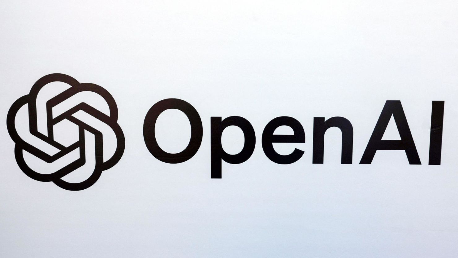 The logo of US artificial intelligence company OpenAI is pictured during a talk by its co-founders at the campus of Tel Aviv University in Tel Aviv on June 5, 2023.