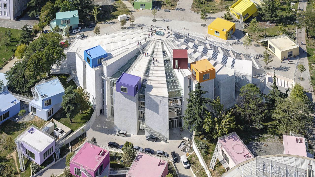   MVRDV architects turned a structure with a complicated history into a new symbol of community in the capital of Albania.