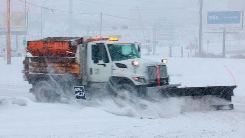 SIOUX CITY, IOWA - JANUARY 08: A snow plow clears the parking lot outside the Horizon Family Restaurant on January 8.