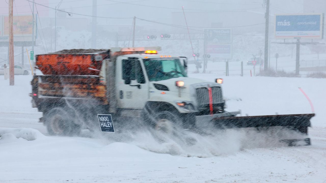 SIOUX CITY, IOWA - JANUARY 08: A snow plow clears the parking lot outside the Horizon Family Restaurant on January 8.