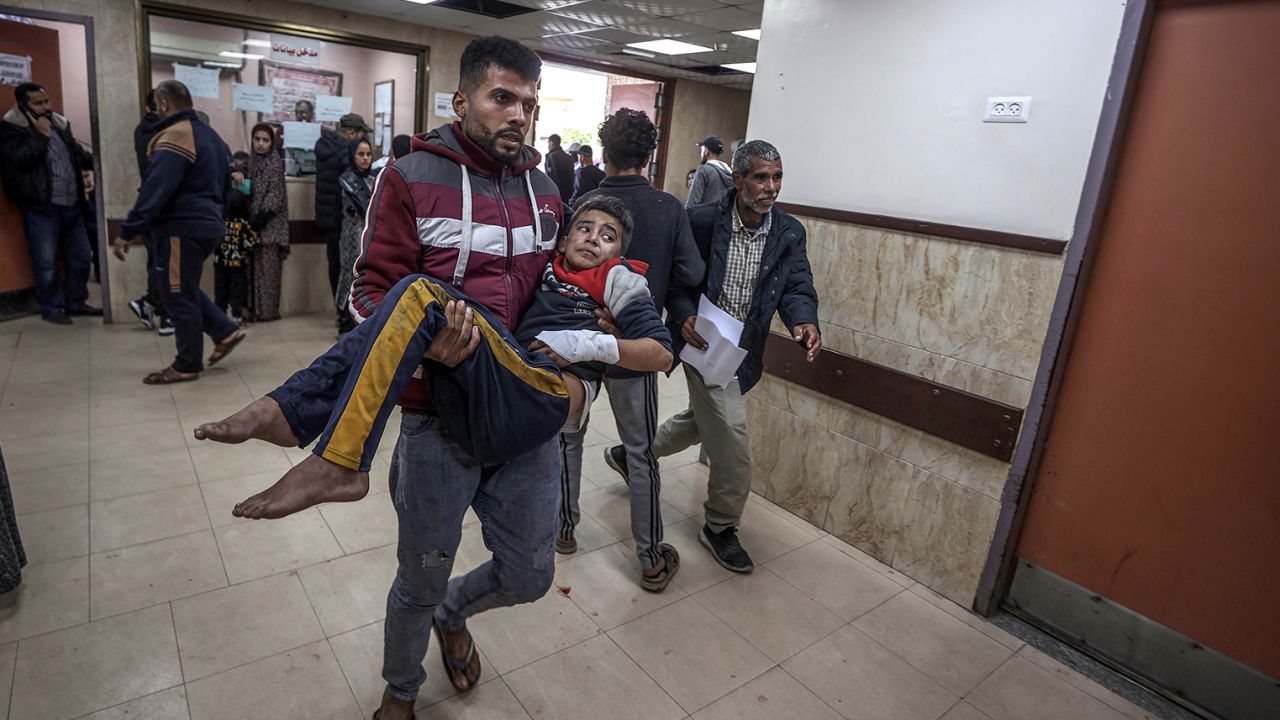Wounded people, including children, are brought to Al-Aqsa Martyrs Hospital for treatment following the Israeli attacks in Deir al-Balah, Gaza on January 4, 2024.