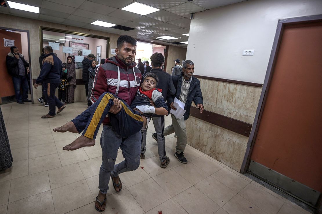 Wounded people, including children, are brought to Al-Aqsa Martyrs Hospital for treatment following the Israeli attacks in Deir al-Balah, Gaza on January 4, 2024.