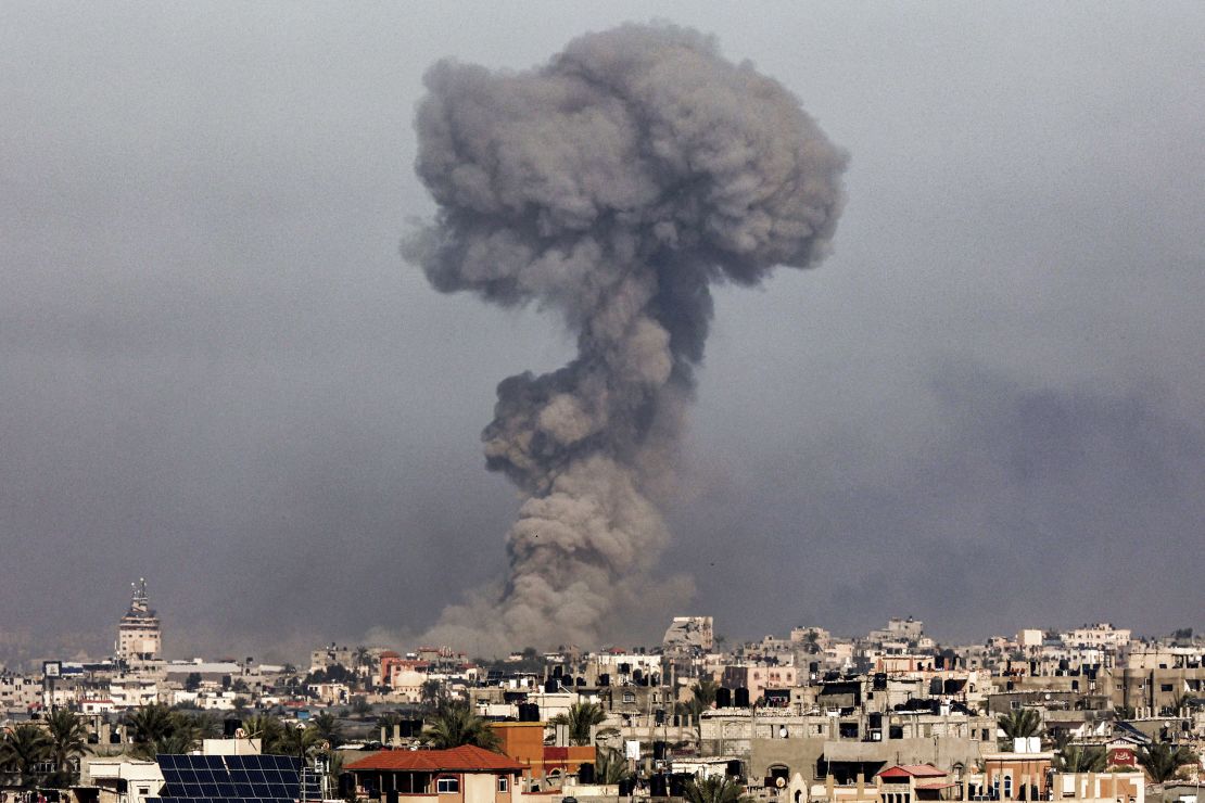 TOPSHOT - A smoke plume erupts over Khan Yunis from Rafah in the southern Gaza strip during Israeli bombardment on January 8, 2024 amid the ongoing conflict between Israel and the Palestinian Hamas militant group. (Photo by AFP) (Photo by -/AFP via Getty Images)
