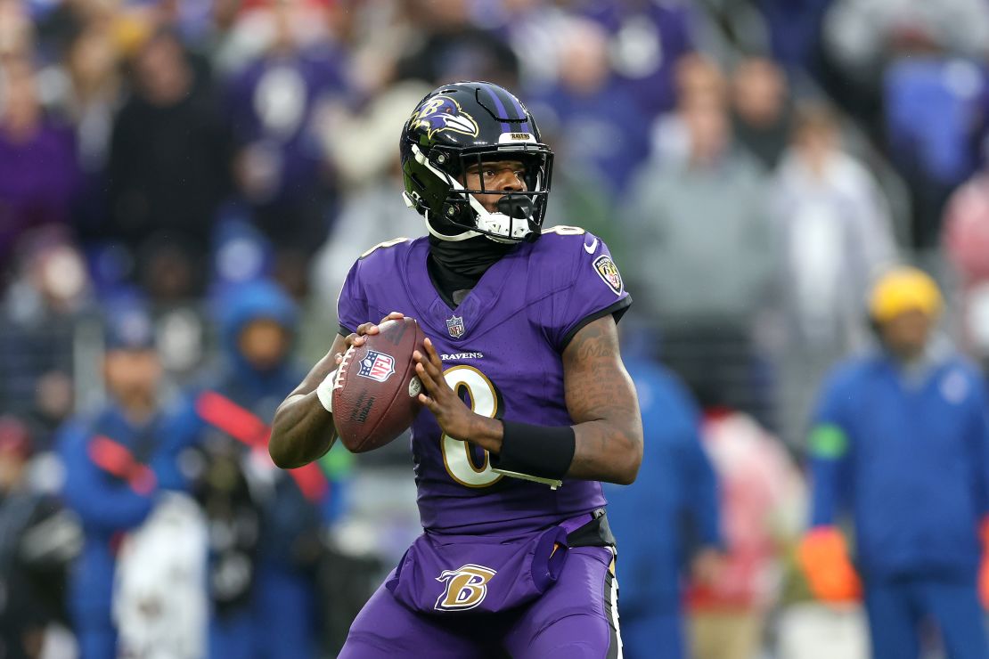 BALTIMORE, MARYLAND - DECEMBER 10: Quarterback Lamar Jackson #8 of the Baltimore Ravens throws a pass against the Los Angeles Rams at M&T Bank Stadium on December 10, 2023 in Baltimore, Maryland. (Photo by Rob Carr/Getty Images)