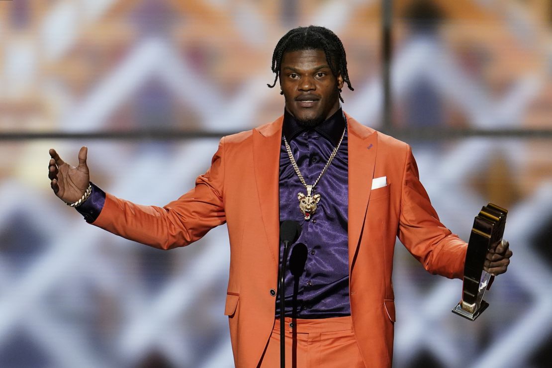 Baltimore Ravens' Lamar Jackson speaks after winning the AP Most Valuable Player award at the NFL Honors football award show Saturday, Feb. 1, 2020, in Miami. (AP Photo/David J. Phillip)