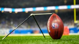 DETROIT, MICHIGAN - JANUARY 07: A detail of a Wilson brand NFL The Duke football held up by a kicking tee during the game between the Minnesota Vikings and Detroit Lions Ford Field on January 07, 2024 in Detroit, Michigan. (Photo by Nic Antaya/Getty Images)