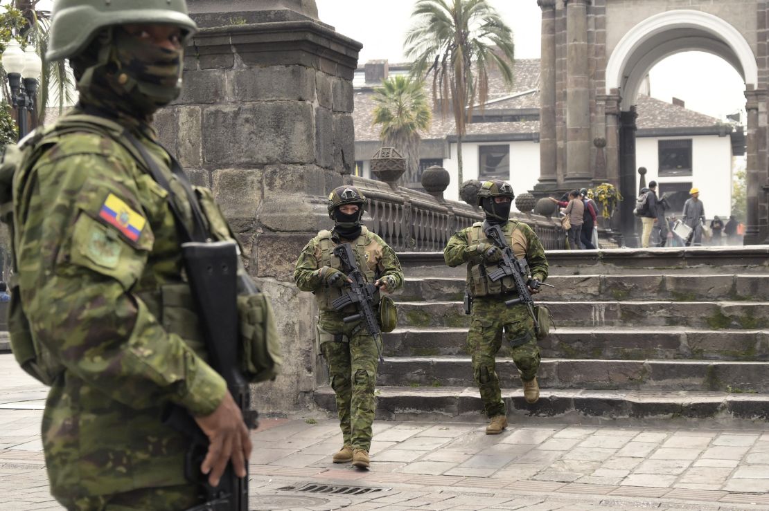 Soldiers are deployed in downtown Quito on January 9, 2024, a day after Ecuadorean President Daniel Noboa declared a state of emergency following the escape from prison of a dangerous narco boss. At least four police officers were kidnapped in Ecuador following a declaration of a 60-day state of emergency on January 8 after dangerous gang leader Adolfo Macias, also known as "Fito," escaped from maximum security detention. (Photo by Rodrigo BUENDIA / AFP)