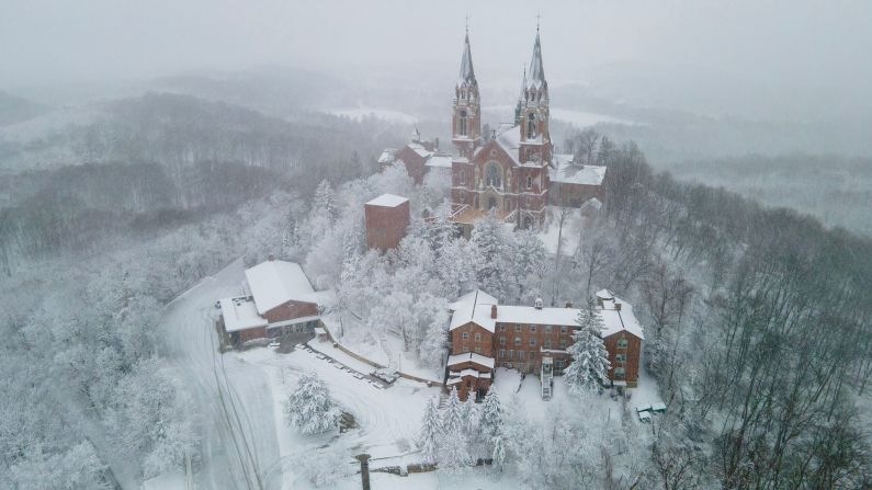 Snow covers the trees around the Holy Hill Basilica and National Shrine of Mary in Hubertus, Wisconsin, on January 9.