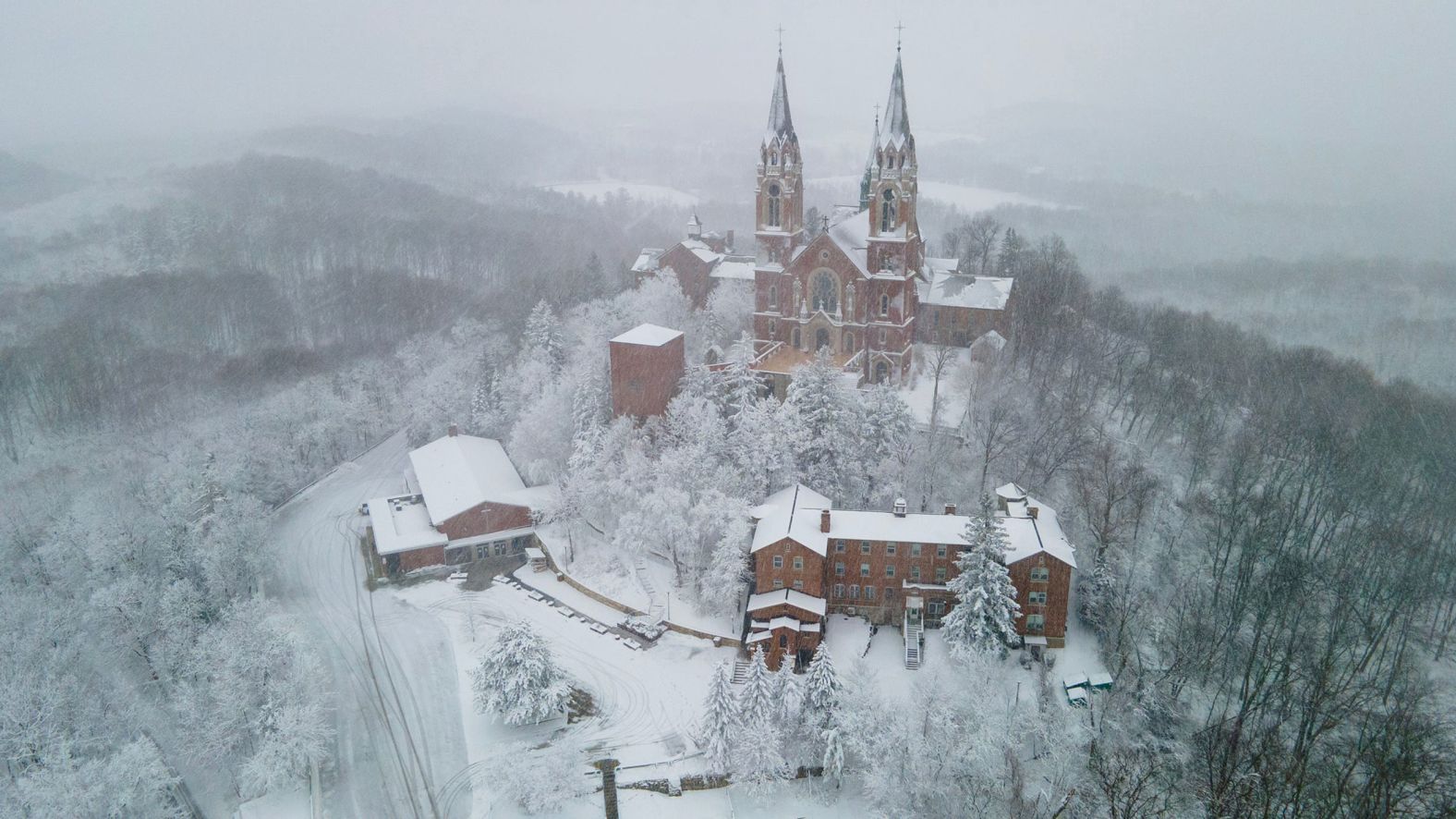 Snow covers the trees around the Holy Hill Basilica and National Shrine of Mary in Hubertus, Wisconsin, on January 9.