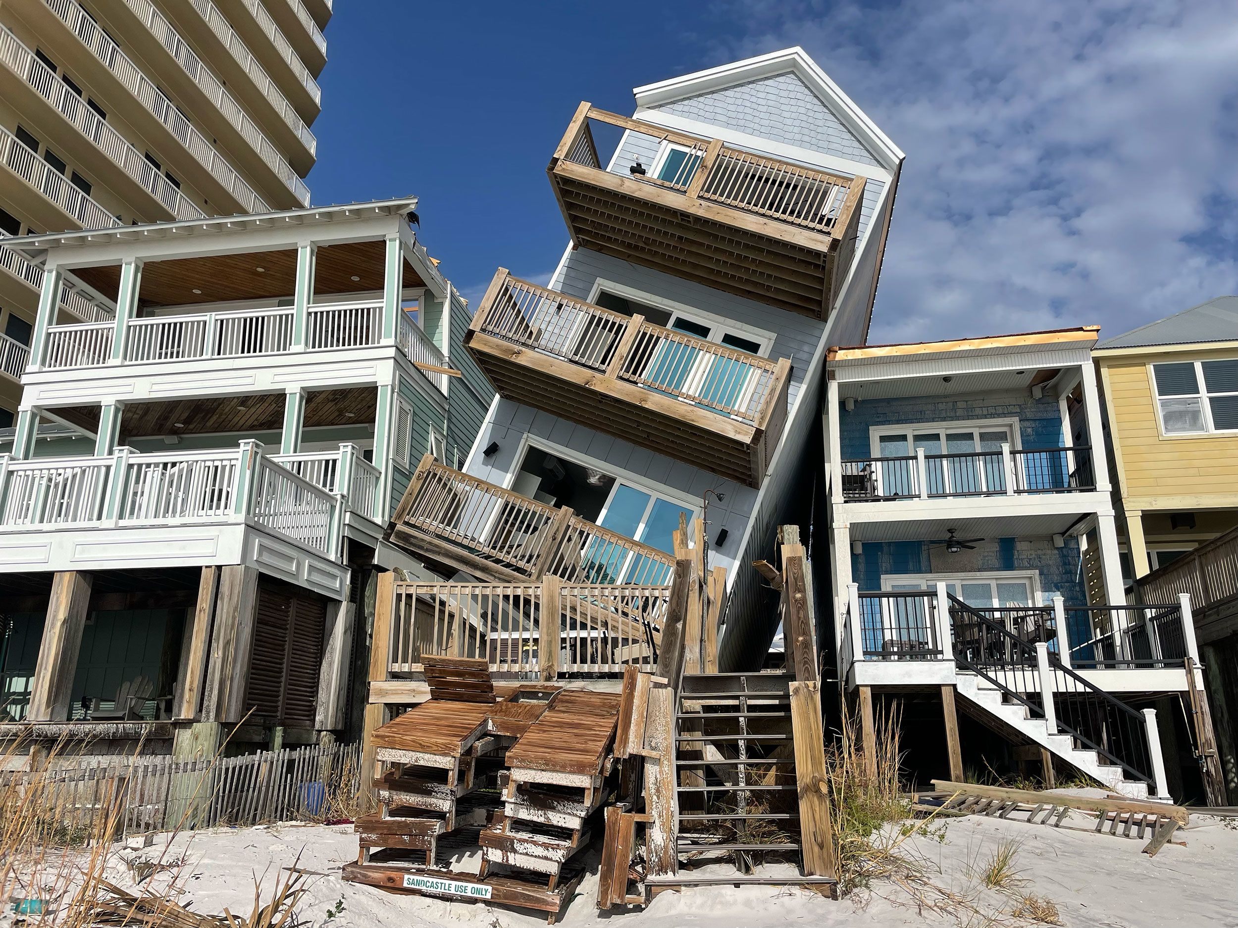 A house is damaged in Panama City Beach, Florida, on Tuesday. Responders rescued people from structures in Florida's Bay County, where multiple tornadoes hit the ground and caused significant damage and road closures, Bay County Sheriff Tommy Ford said.