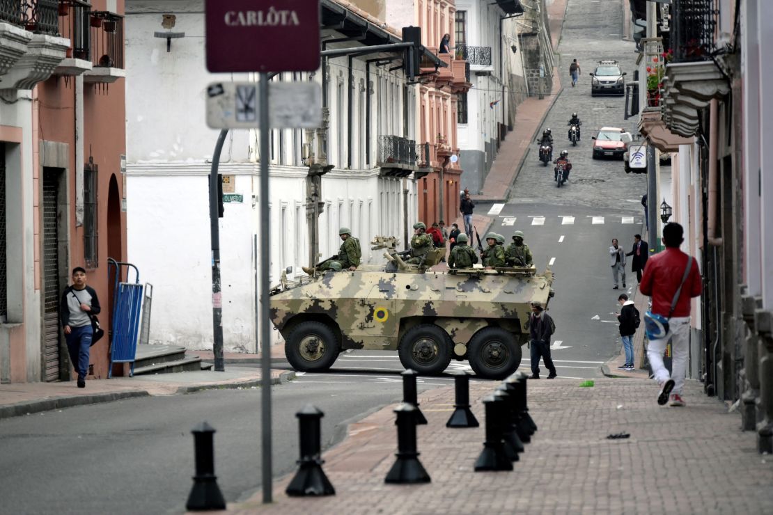 Ecuadorean security forces patrol the area around the main square and presidential palace after Ecuadorean President Daniel Noboa declared the country in a state of "internal armed conflict" and ordered the army to carry out military operations against the country's powerful drug gangs, in downtown Quito on January 9, 2024. Ecuador's new president, 36-year-old Daniel Noboa, is grappling with a security nightmare after the escape from prison of one of the country's most high profile gangsters, Jose Adolfo Macias, known as "Fito." (Photo by Rodrigo BUENDIA / AFP)