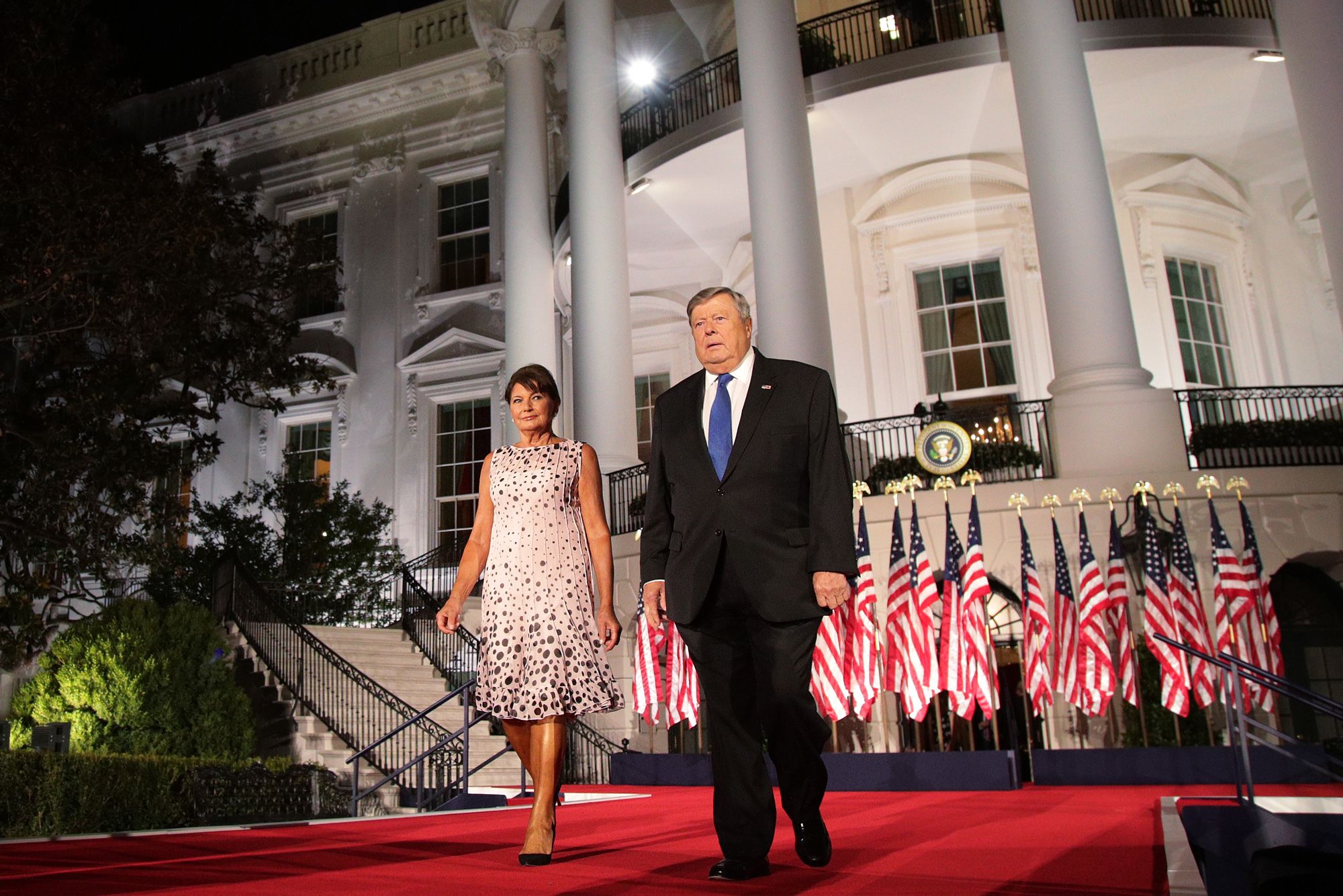 Amalija Knavs and Viktor Knavs, with the Trump family