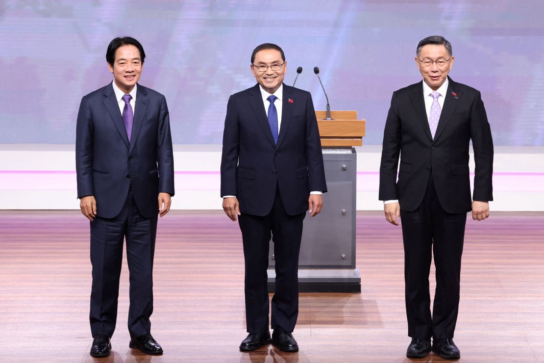 (L-R) Lai Ching-te, presidential candidate from the ruling Democratic Progressive Party (DPP), Hou Yu-ih, presidential candidate from the main opposition Kuomintang (KMT), and Ko Wen-je, presidential candidate from the opposition Taiwan People's Party (TPP), pose for a picture during a debate in Taipei on December 30, 2023. (Photo by Pei Chen / POOL / AFP) (Photo by PEI CHEN/POOL/AFP via Getty Images)