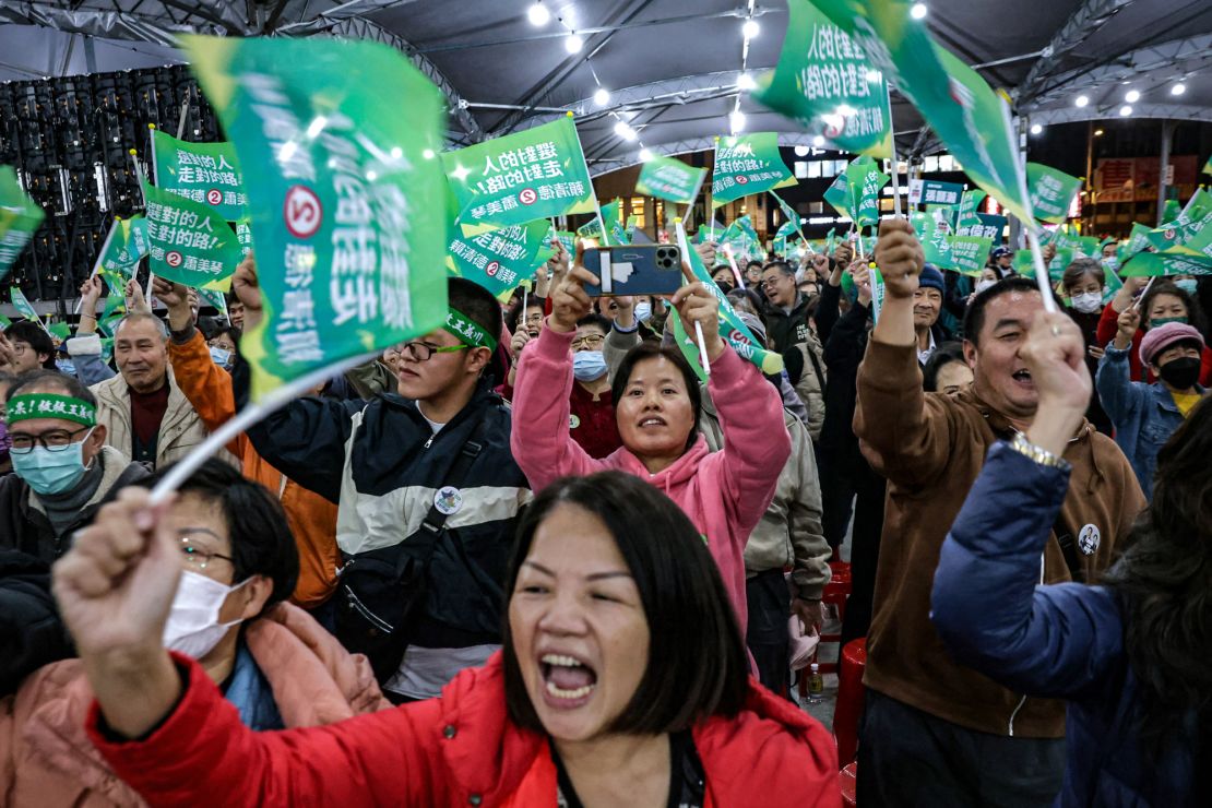 Supporters of Lai Ching-te, presidential candidate of Democratic Progressive Party (DPP), cheer during an election campaign rally, in Keelung on January 8, 2024, ahead of the upcoming presidential elections. (Photo by I-Hwa CHENG / AFP) (Photo by I-HWA CHENG/AFP via Getty Images)