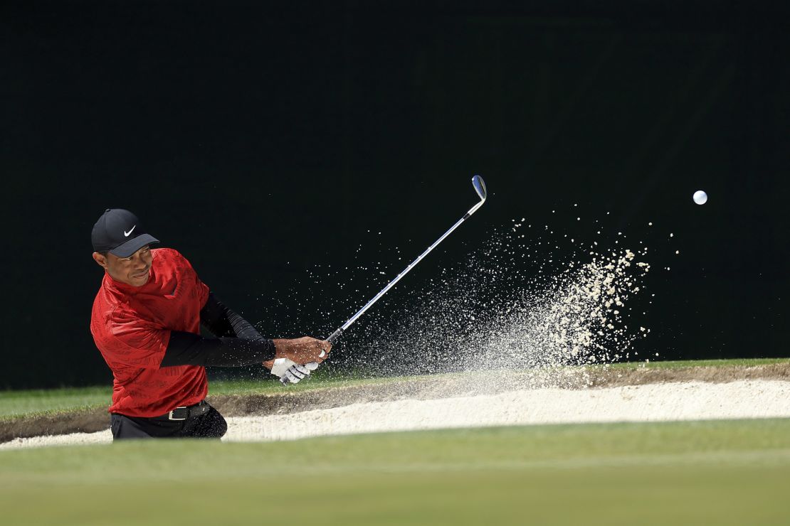AUGUSTA, GEORGIA - APRIL 10: Tiger Woods plays his shot from the bunker on the fourth hole during the final round of the Masters at Augusta National Golf Club on April 10, 2022 in Augusta, Georgia. (Photo by David Cannon/Getty Images)