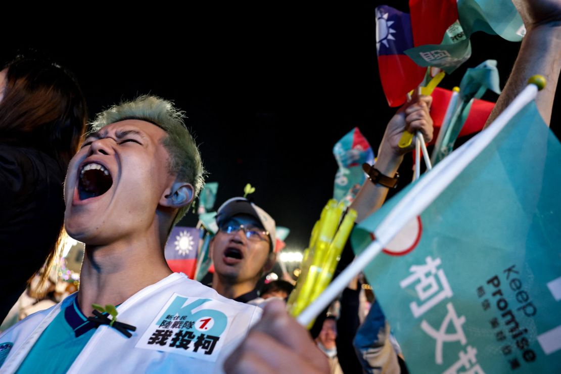 Supporters cheer at an election campaign rally for Taiwan People's Party (TPP) presidential candidate Ko Wen-je in Taichung on January 6, 2024.