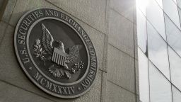 FILE - The seal of the U.S. Securities and Exchange Commission at SEC headquarters, June 19, 2015, in Washington. The Securities and Exchange Commission said Tuesday, Jan. 9, 2024, that a post on X, formerly known as Twitter, announcing that the securities regulator had approved the trading of exchange-traded funds holding bitcoin was fake, and that the agency's account had been "compromised." (AP Photo/Andrew Harnik, File)