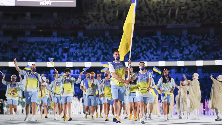 TOKYO, JAPAN - JULY 23: Flag bearers Olena Kostevych and Bogdan Nikishin of Team Ukraine during the Opening Ceremony of the Tokyo 2020 Olympic Games at Olympic Stadium on July 23, 2021 in Tokyo, Japan. (Photo by Matthias Hangst/Getty Images)