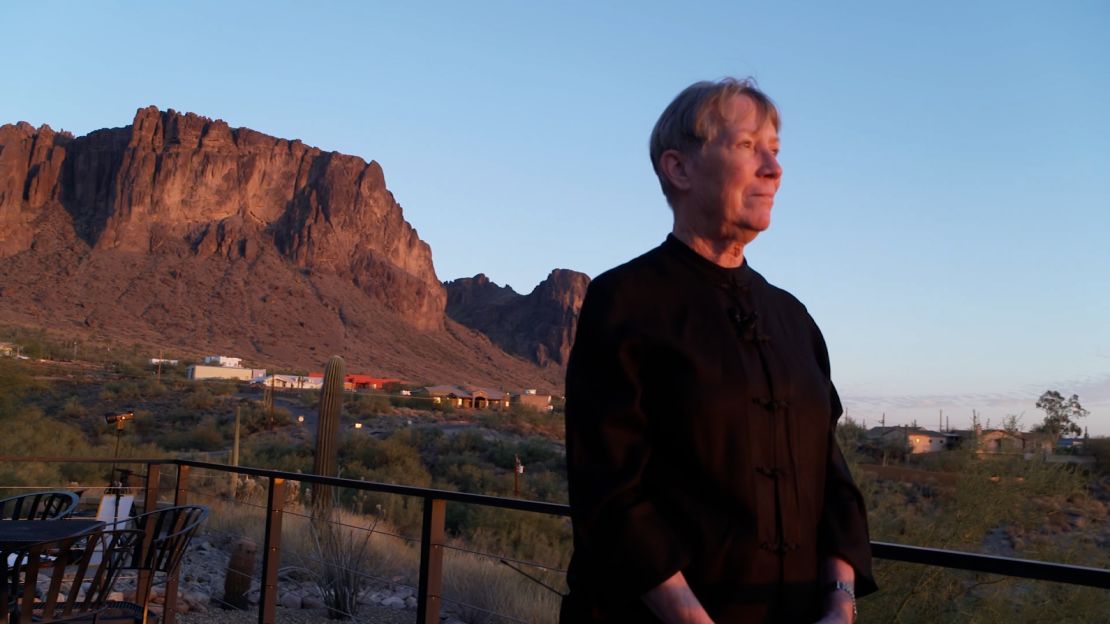 Geri Roll, the former election director in Pinal County, at the foot of the Superstition Mountains. She says conspiracy theories about elections are “nonsensical.”<br /><br />