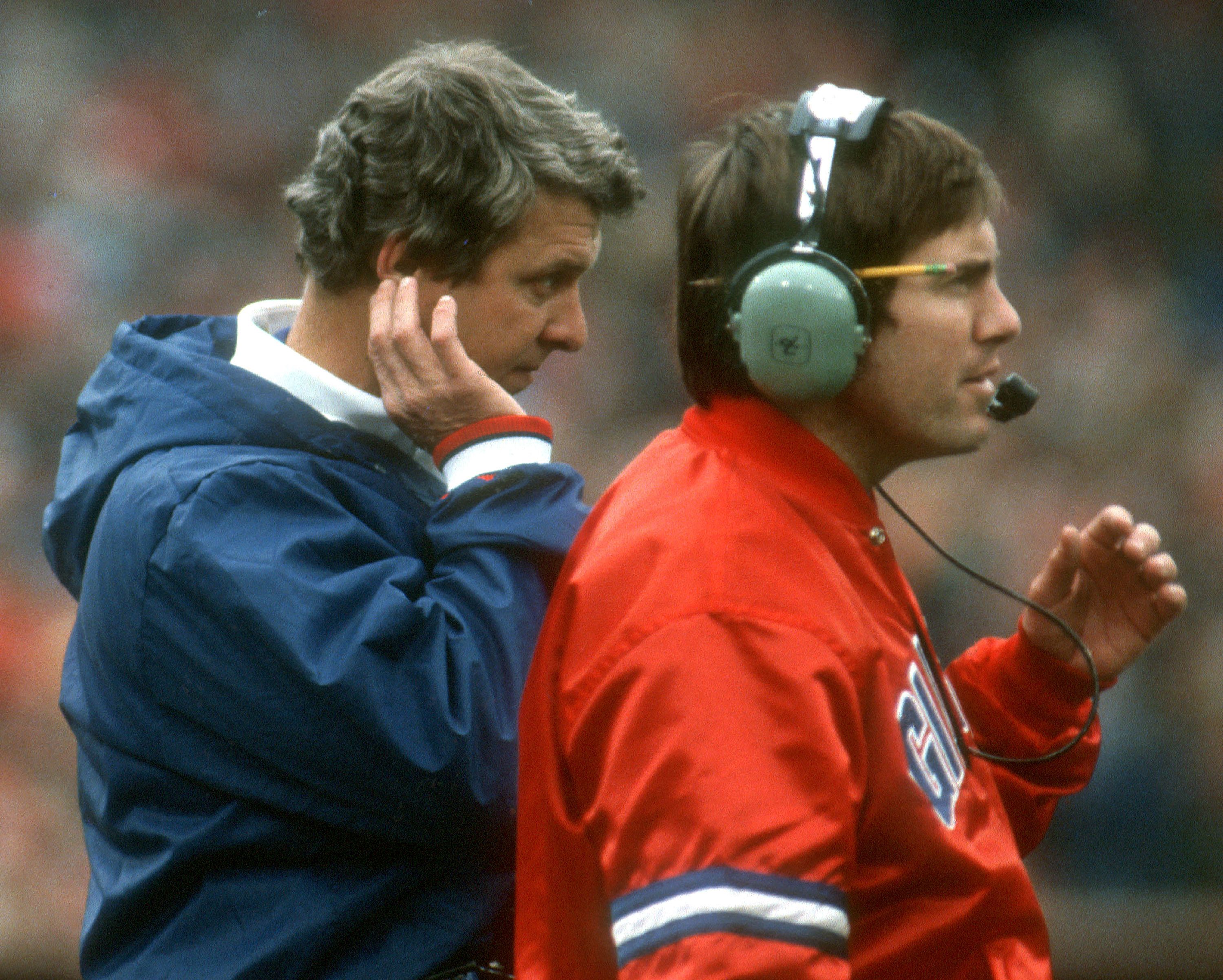 Belichick, right, coaches alongside New York Giants head coach Bill Parcells during a playoff game in 1984. Belichick later became Parcells' defensive coordinator, and they won two Super Bowl titles together.