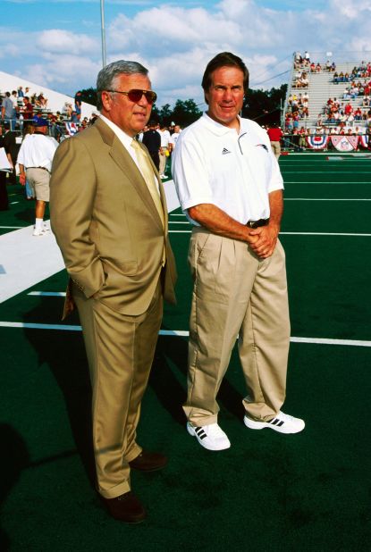 Belichick meets with New England Patriots owner Robert Kraft before the NFL Hall of Fame Game in 2000. Kraft hired Belichick to be head coach of the Patriots.