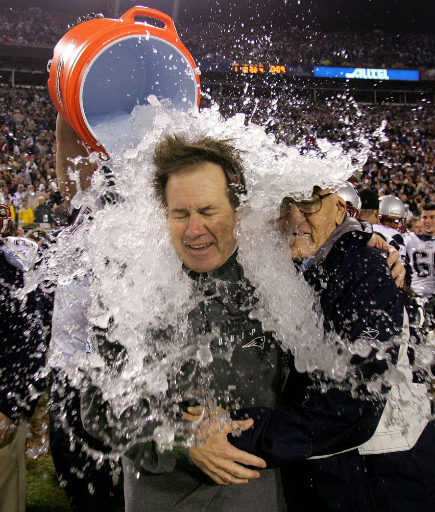 Belichick and his father, Steve, are doused with water after the Patriots defeated the Philadelphia Eagles to win the Super Bowl in 2005. It was the Patriots' third Super Bowl victory in four seasons.