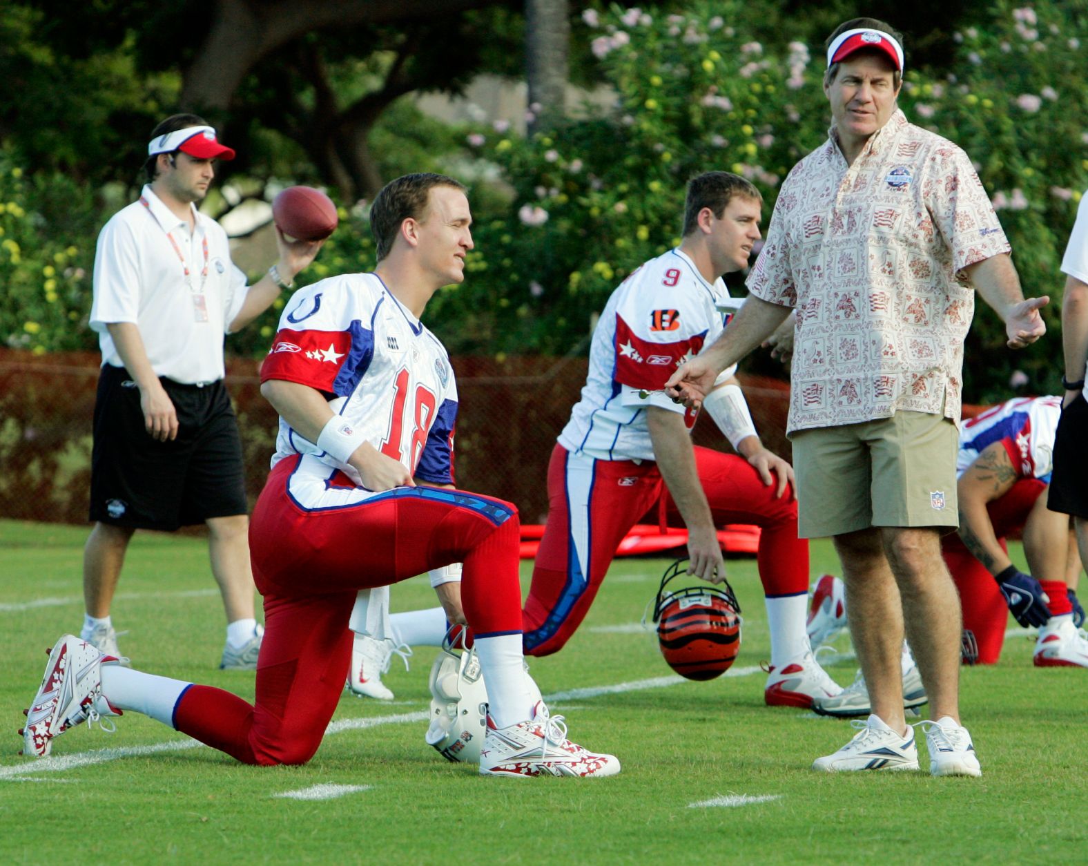 Belichick talks with Indianapolis Colts quarterback Peyton Manning during a Pro Bowl practice in Hawaii in 2007.