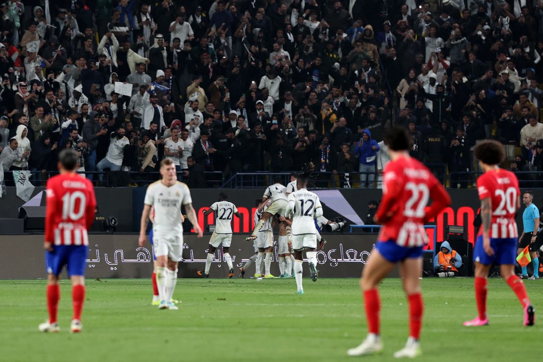 Real Madrid's players celebrate their fifth goal during the Spanish Super Cup semi-final football match between Real Madrid and Atletico Madrid at the Al-Awwal Park Stadium in Riyadh, on January 10, 2024. (Photo by Giuseppe CACACE / AFP) (Photo by GIUSEPPE CACACE/AFP via Getty Images)