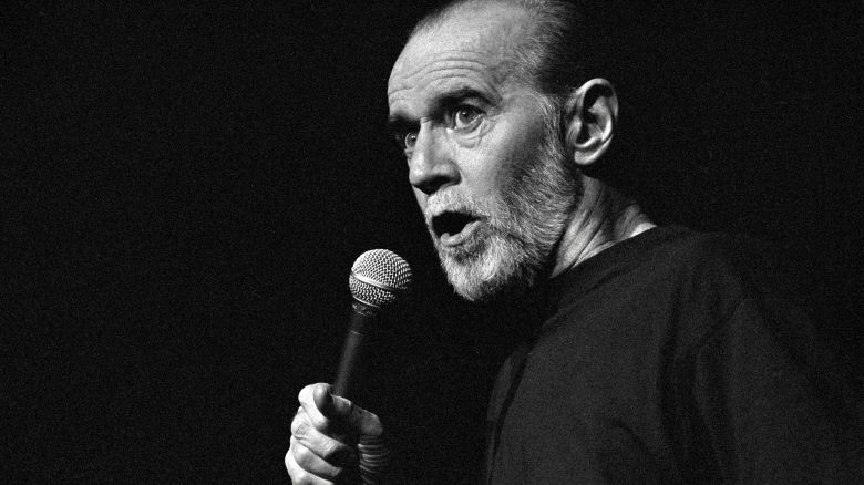 George Denis Patrick Carlin performs a standup routine at the Cheyenne Civic Center on June 1, 1992 in Cheyenne, Wyoming.