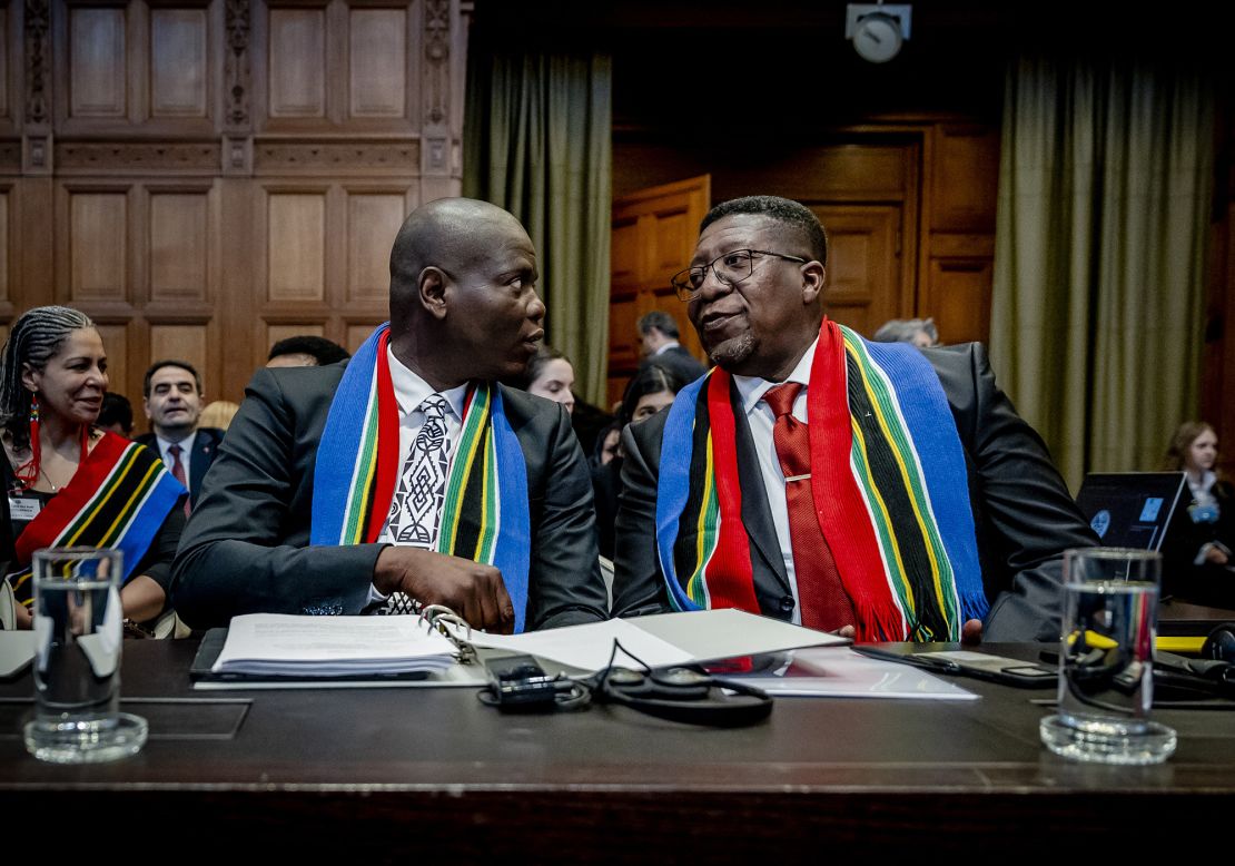 South Africa Minister of Justice Ronald Lamola and South African Ambassador to the Netherlands Vusimuzi Madonsela attend the International Court of Justice (ICJ) ahead of the hearing of the genocide case against Israel brought by South Africa, in The Hague on January 11, 2024. South Africa hopes that a landmark "genocide" case against Israel at the UN's top court on Januray 11, will seek to compel Israel to halt its military operations in Gaza. (Photo by Remko de Waal / ANP / AFP) / Netherlands OUT (Photo by REMKO DE WAAL/ANP/AFP via Getty Images)