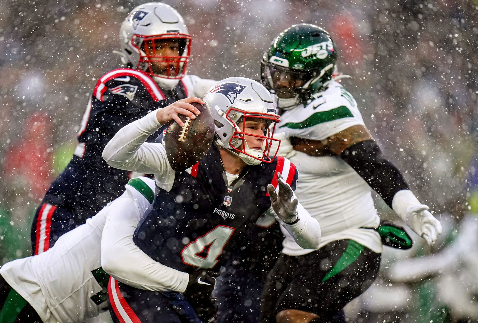 New England Patriots quarterback Bailey Zappe is sacked by New York Jets linebacker Bryce Huff in an NFL game in Foxborough, Massachusetts, on Sunday, January 7. It was the last game of the season for each team, as they both finished with losing records and missed the playoffs. It was also the last game in charge for Patriots head coach <a href="index.php?page=&url=http%3A%2F%2Fwww.cnn.com%2F2024%2F01%2F11%2Fsport%2Fgallery%2Fbill-belichick%2Findex.html" target="_blank">Bill Belichick</a>, who confirmed Thursday that he would be leaving the team after 24 seasons and six Super Bowl titles.