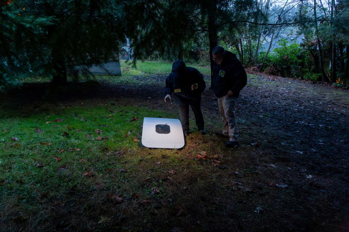 National Transportation Safety Board (NTSB) investigators examine the fuselage plug area of Alaska Airlines Flight 1282. 