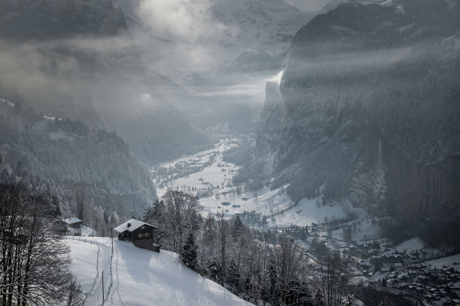 The Swiss village of Lauterbrunnen can be seen below from the Wengen ski resort in the Bernese Alps on Tuesday, January 9.