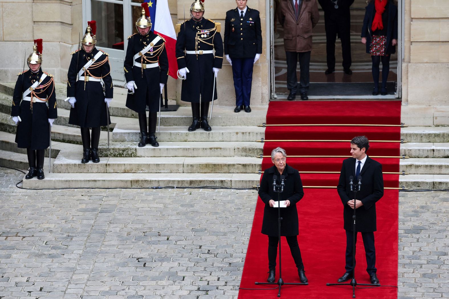 Outgoing French Prime Minister Elisabeth Borne delivers a speech next to newly appointed Prime Minister Gabriel Attal during the handover ceremony in Paris on Tuesday, January 9. <a href="index.php?page=&url=https%3A%2F%2Fwww.cnn.com%2F2024%2F01%2F09%2Feurope%2Fgabriel-attal-french-prime-minster-intl%2Findex.html" target="_blank">Attal will be France's youngest-ever prime minister and the first openly gay man to serve in the post</a> — making him one of the world's most prominent and powerful LGBTQ politicians.