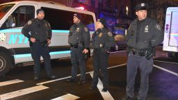 NEW YORK, UNITED STATES - DECEMBER 31: Police officers stand guard on a road after a 19-year-old assailant attacked three NYPD officers with a machete near Times Square during the new year celebrations in New York, United States on December 31, 2022. (Photo by Kyle Mazza/Anadolu Agency via Getty Images)