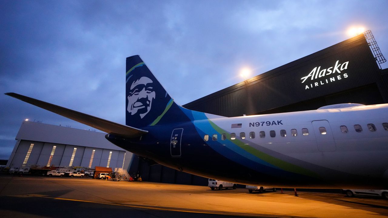 An Alaska Airlines Boeing 737 Max 9 with a door plug aircraft awaits inspection at the airline's hangar at Seattle-Tacoma International Airport Wednesday, Jan. 10, 2024, in SeaTac, Wash. On a Jan. 5 Alaska Airlines flight, a panel used to plug an area reserved for an exit door blew open midair, forcing it to return to Portland. (AP Photo/Lindsey Wasson)