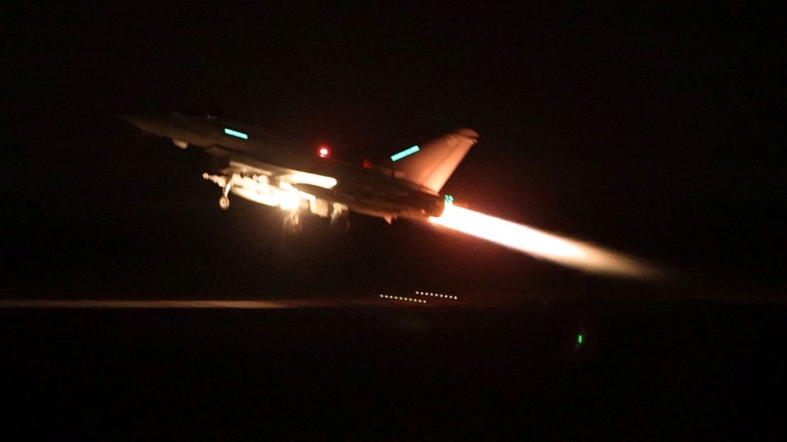 An RAF Typhoon aircraft takes off to join the US-led coalition from RAF Akrotiri to conduct air strikes against military targets in Yemen, aimed at the Iran-backed Houthi militia that has been targeting international shipping in the Red Sea, in Cyprus, in this handout picture released on January 12, 2024, local time.