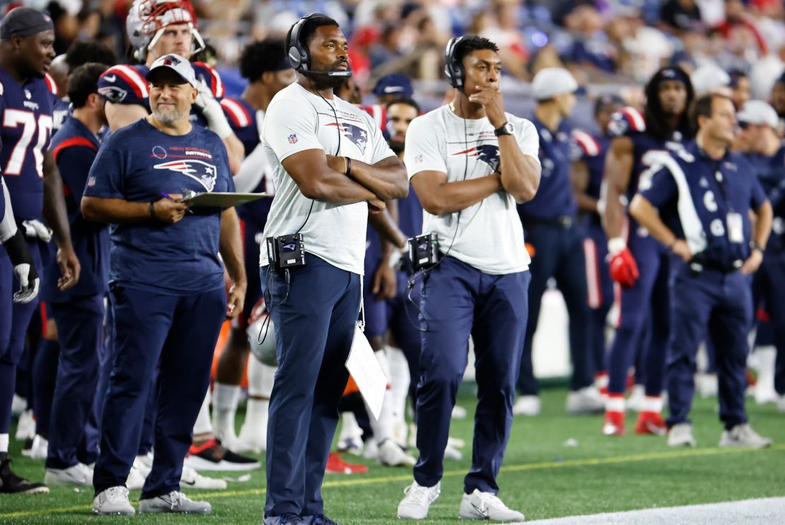 New England Patriots inside linebackers coach Jerod Mayo and New England Patriots defensive line coach Demarcus Covington during a preseason game between the New England Patriots and the Washington Football Team on August 12, 2021, at Gillette Stadium in Foxborough, Massachusetts.