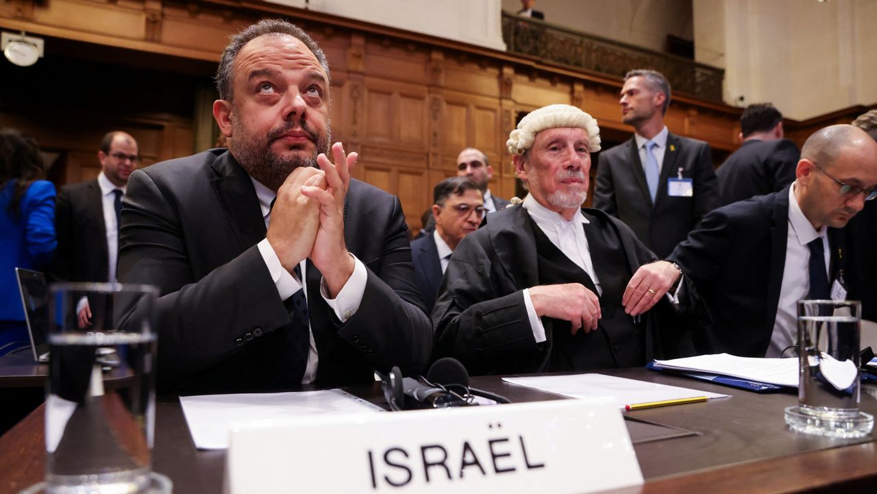 Legal adviser to Israel's Foreign Ministry Tal Becker and British jurist Malcolm Shaw sit inside the International Court of Justice (ICJ) as judges hear a request for emergency measures to order Israel to stop its military actions in Gaza, in The Hague, Netherlands January 12, 2024. REUTERS/Thilo Schmuelgen