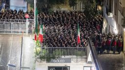 People appear to give the banned fascist salute during a rally to commemorate the slaying in 1978 of two members of a neo-fascist youth group in an attack later claimed by extreme-left militants, in Rome, Sunday Jan. 7, 2024. Opposition politicians in Italy demanded on Monday that Italy's government explain how hundreds of demonstrators were able to give a banned fascist salute at a Rome rally without any police intervention. (Francesco Benvenuti/LaPresse via AP)