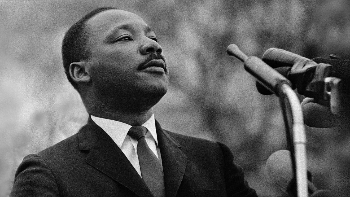MONTGOMERY, AL - MARCH 25:  Dr Martin Luther King Jr speaking before crowd of 25,000 Selma To Montgomery, Alabama civil rights marchers, in front of Montgomery, Alabama state capital building. On March 25, 1965 in Montgomery, Alabama. (Photo by Stephen F. Somerstein/Getty Images)