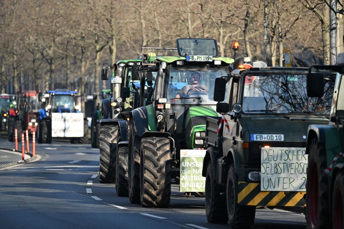 Farmers demonstrate against government plans to scrap diesel tax subsidies for agriculture vehicles in Frankfurt, western Germany, on January 11, 2024. Farmers have been up in arms over government plans to withdraw tax breaks for the agricultural sector. The government already partially walked back the planned subsidy cuts. A discount on vehicle tax for agriculture would remain in place, while a diesel subsidy would be phased out over several years instead of being abolished immediately, the government said. (Photo by Kirill KUDRYAVTSEV / AFP) (Photo by KIRILL KUDRYAVTSEV/AFP via Getty Images)