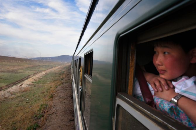 AXMTR2 The Trans-Mongolian train leaves Ulaan Baator, Mongolia en route to Siberia, Russia.. Image shot 2005. Exact date unknown.