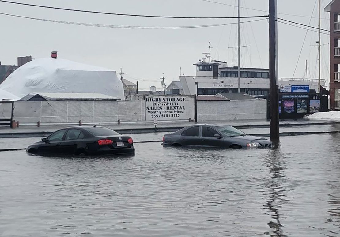 Cars sit in floodwaters caused by high tides in Portland, Maine, on Saturday, January 13.