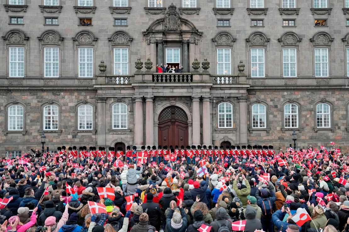 Denmark's King Frederik X and Denmark's Queen Mary wave standing with their children from the balcony of Christiansborg Palace in Copenhagen, Denmark, Sunday, Jan. 14, 2024.