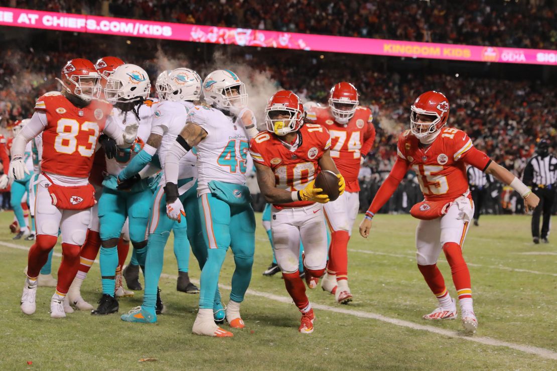 KANSAS CITY, MISSOURI - JANUARY 13: Isiah Pacheco #10 of the Kansas City Chiefs celebrates after scoring a touchdown during the fourth quarter against the Miami Dolphins in the AFC Wild Card Playoffs at GEHA Field at Arrowhead Stadium on January 13, 2024 in Kansas City, Missouri. (Photo by David Eulitt/Getty Images)