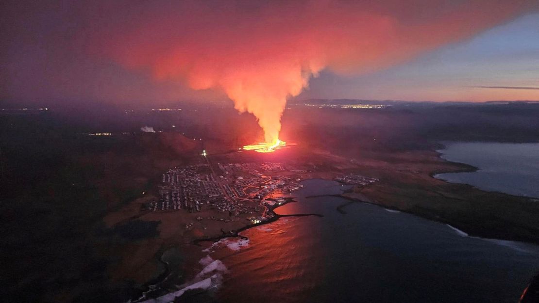 A volcano spews lava and smoke as it erupts in Reykjanes Peninsula, Iceland, January 14, 2024.