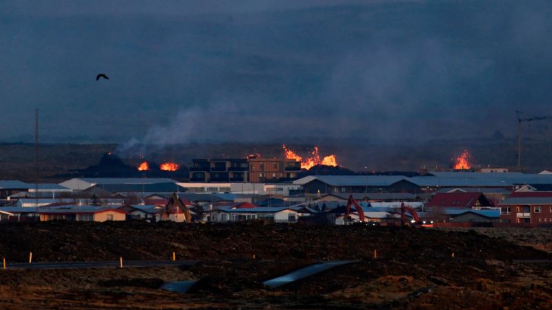 Buildings burn as lava from Icelandic volcano eruption flows into evacuated fishing town